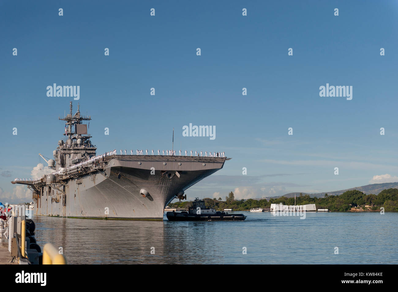 The amphibious assault ship USS Wasp (LHD 1) arrives at Joint Base Pearl Harbor-Hickam for a scheduled Stock Photo