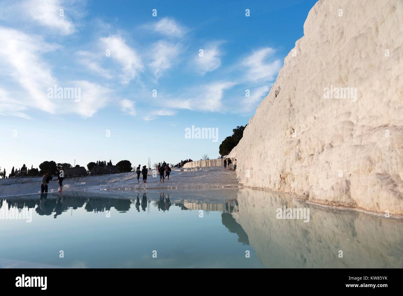JANUARY 24; 2015 PAMUKKALE Pamukkale,is a natural site in Denizli Province in southwestern Turkey. Unidentified visitors are walks on travertines. Stock Photo