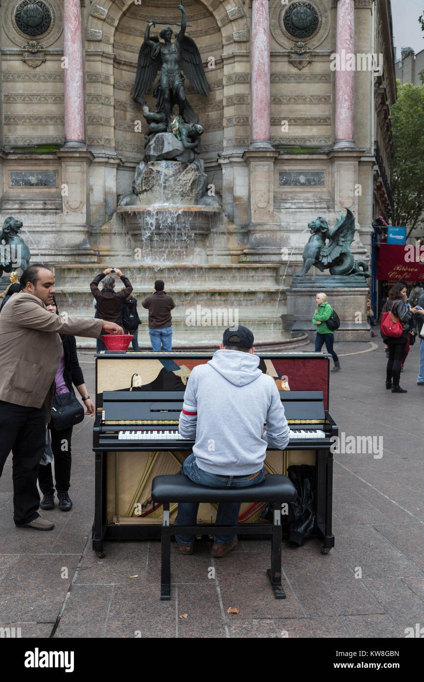 Pianist playing in Place Saint Michel, Paris, France Stock Photo