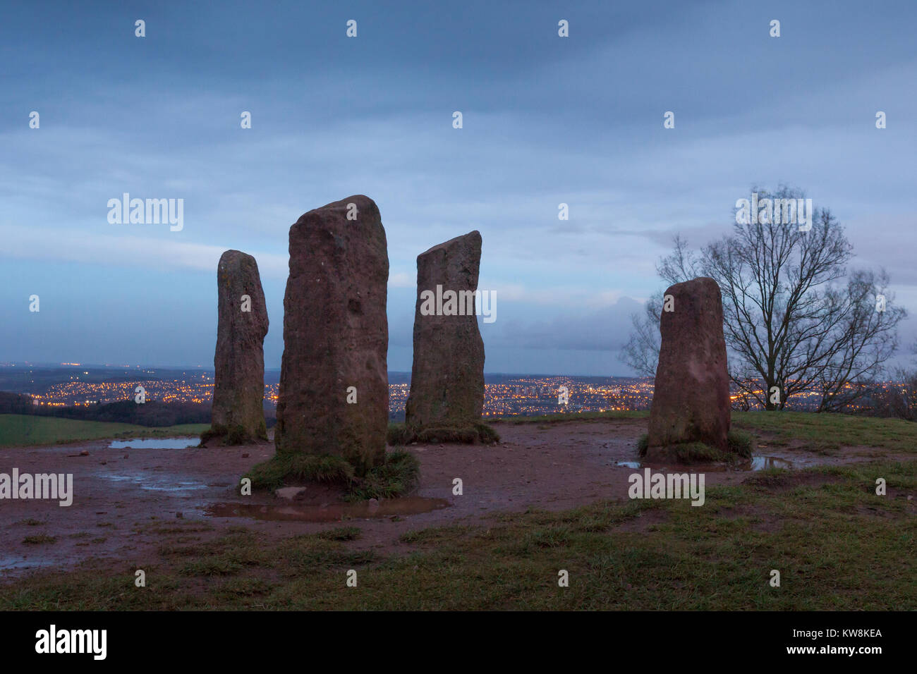 Clent, Worcestershire, UK. 31st December, 2017. On the last day of 2017, a gloomy dawn sky is pictured over the four stones in the Clent Hills, just southwest of Birmingham and the Black Country, UK.  Peter Lopeman/Alamy Live News Stock Photo