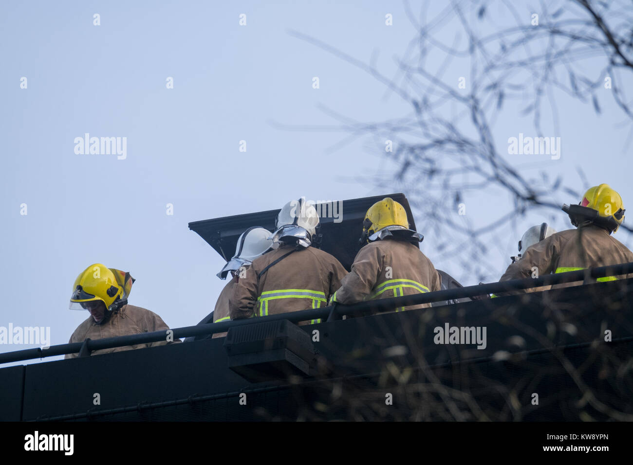 Liverpool, UK: Jan 1, 2018. Emergency services remain at the scene of a car park fire on Monday, January 1, 2018 at the Echo Arena car park in Liverpool, UK. The fire, which started on December 31, 2017 is believed to have destroyed all vehicles inside the car park. Credit: Christopher Middleton/Alamy Live News Stock Photo