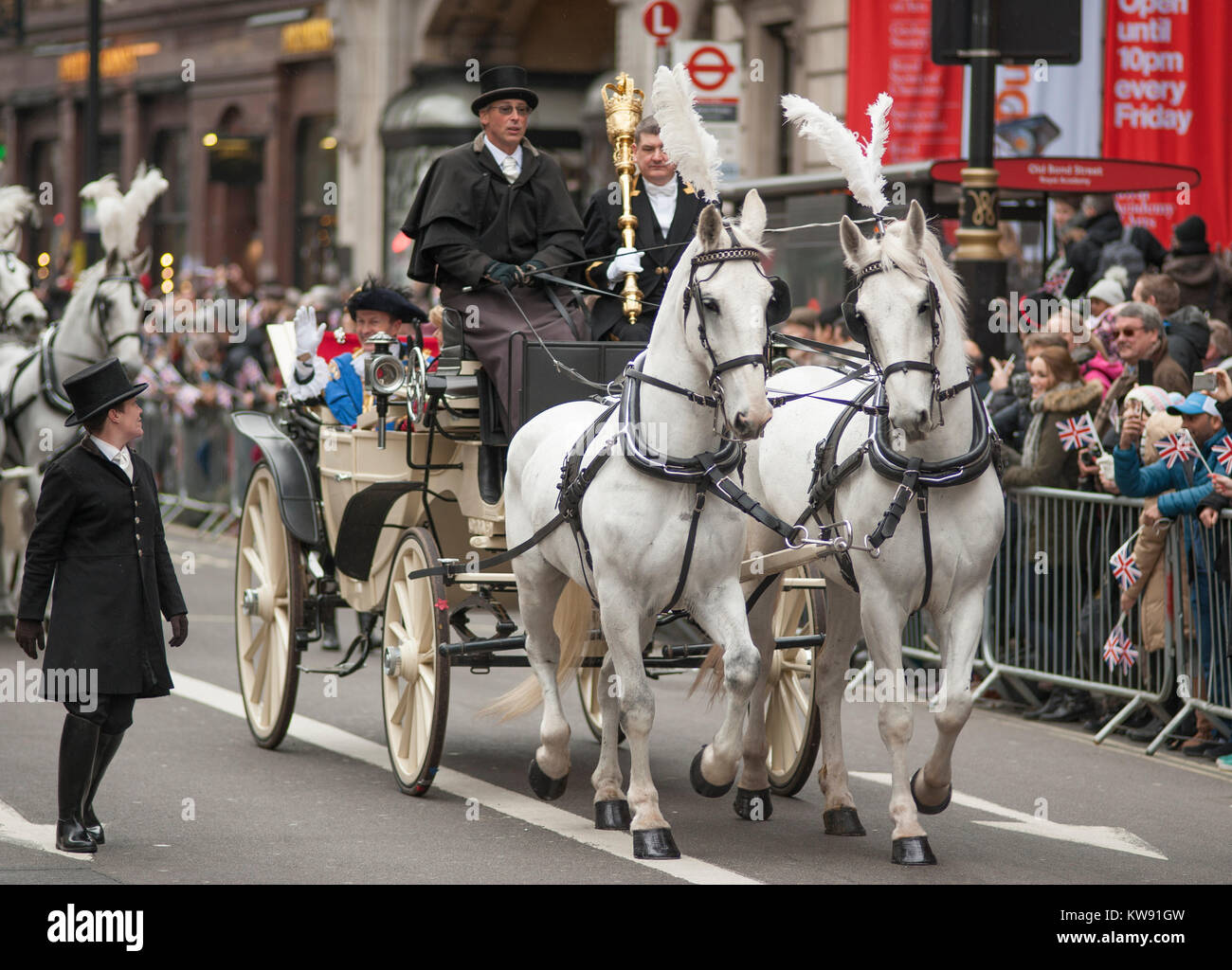 Central London, UK. 1st Jan, 2018. London's spectacular New Year's Day Parade starts at 12 noon in Piccadilly, making it's way down famous West End thoroughfares, finishing in Parliament Square at 3.00pm. Horse drawn landau with The Lord Mayor of The City of Westminster. Credit: Malcolm Park/Alamy Live News. Stock Photo