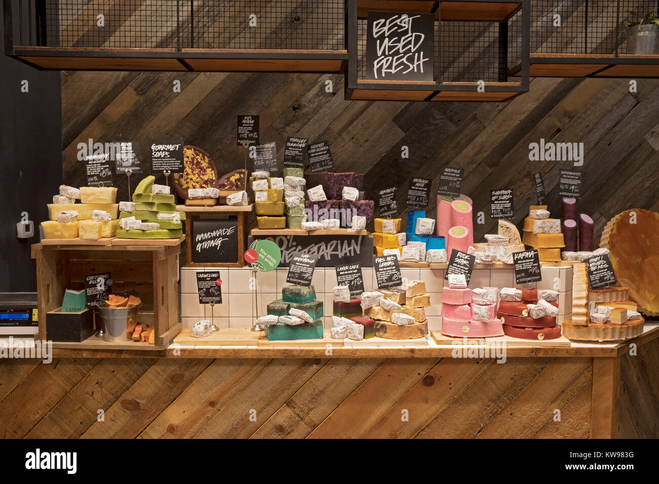 Beautiful and colorful display of soaps for sale at Lush, a handmade