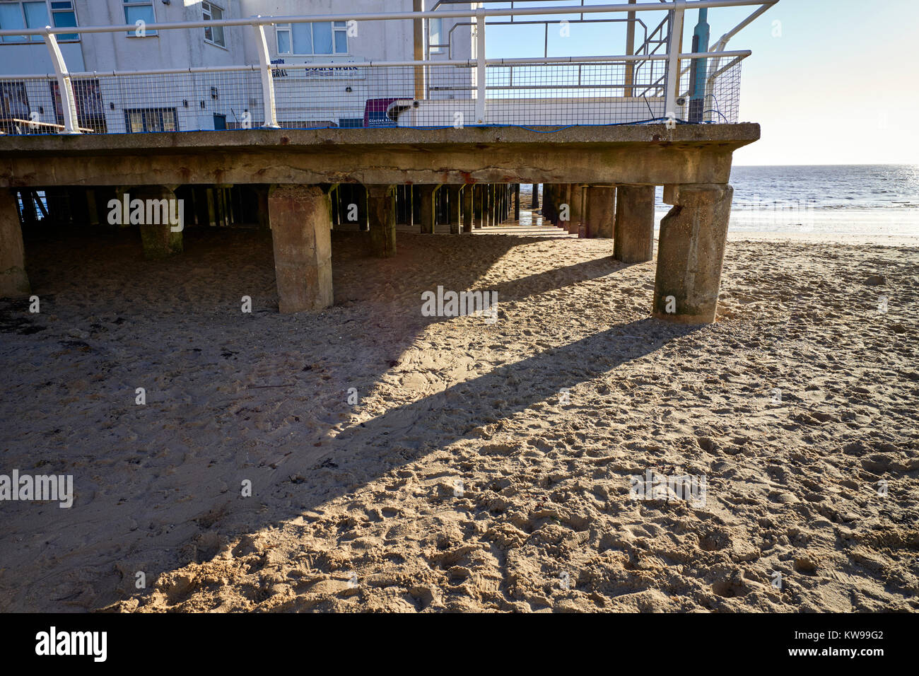 Detail of concrete pillars supporting Clacton pier Stock Photo