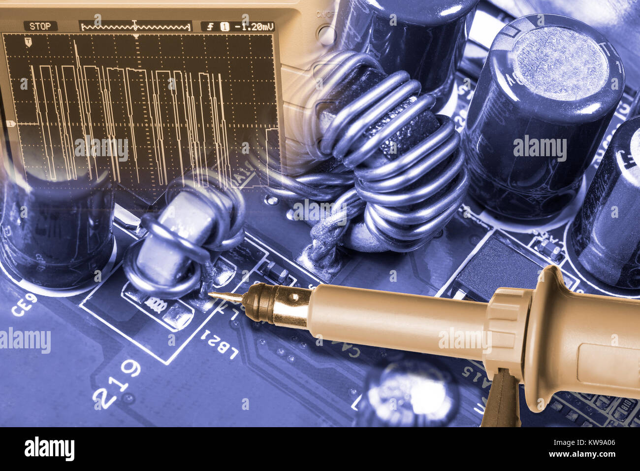 Detail of computer hardware. Repair of mainboard. Concept of measurement using digital oscilloscope. Stock Photo