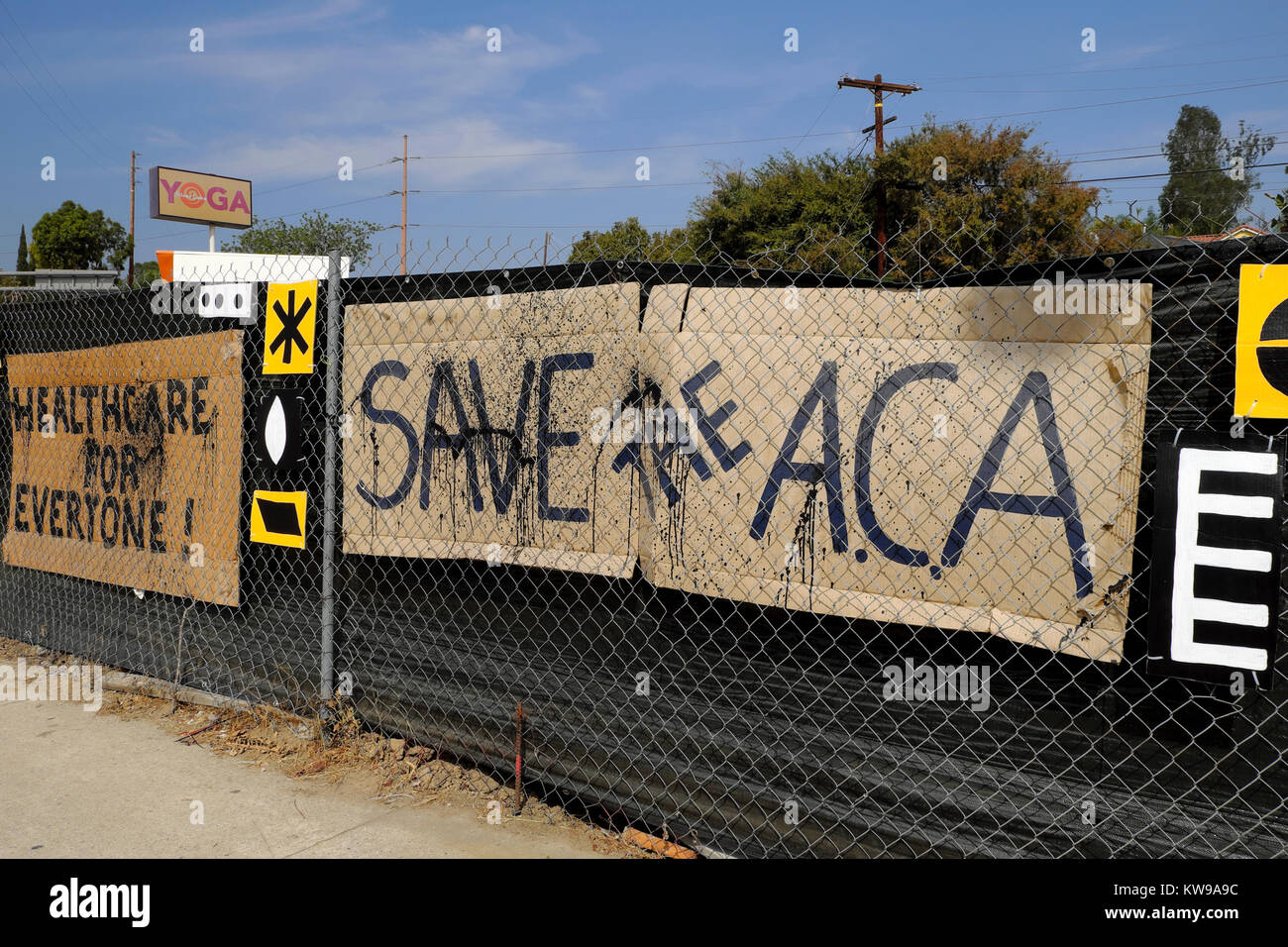 Pro American Healthcare plan Save the ACA poster on a roadside fence in Silver Lake neighborhood of Los Angeles, California USA  2017   KATHY DEWITT Stock Photo