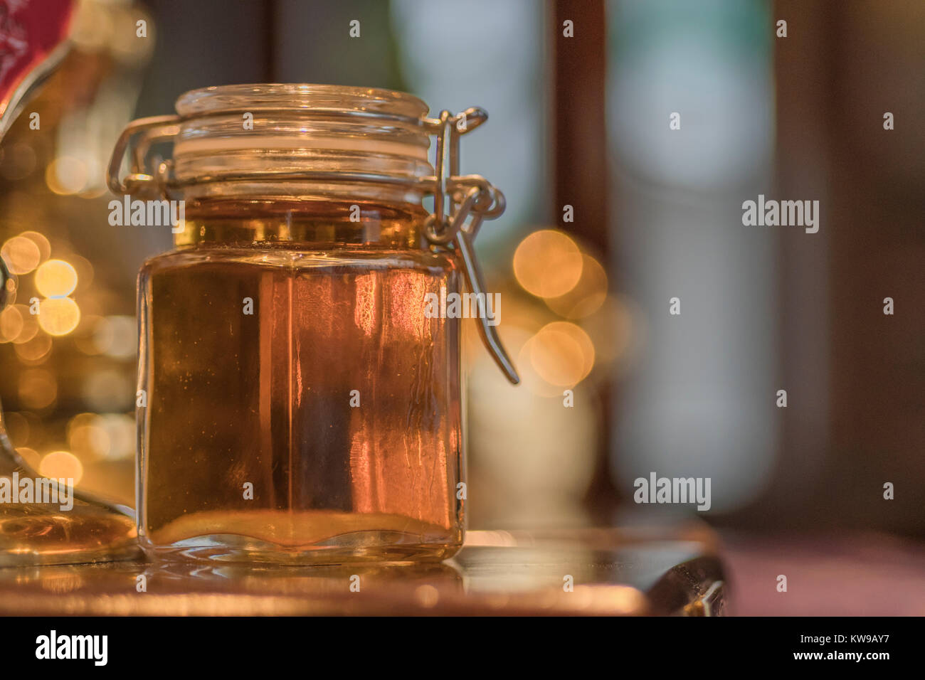 Small jar with a sample of a real ale in a Pub. Stock Photo