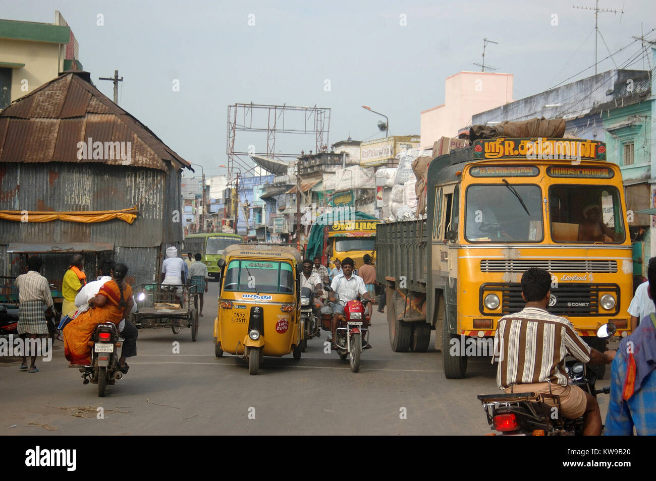 TAMIL NADU, INDIA, circa 2009: Traffic and pedestrians clash in the streets, circa 2009 in Tirunelveli, Tamil Nadu, India. India's population is more  Stock Photo