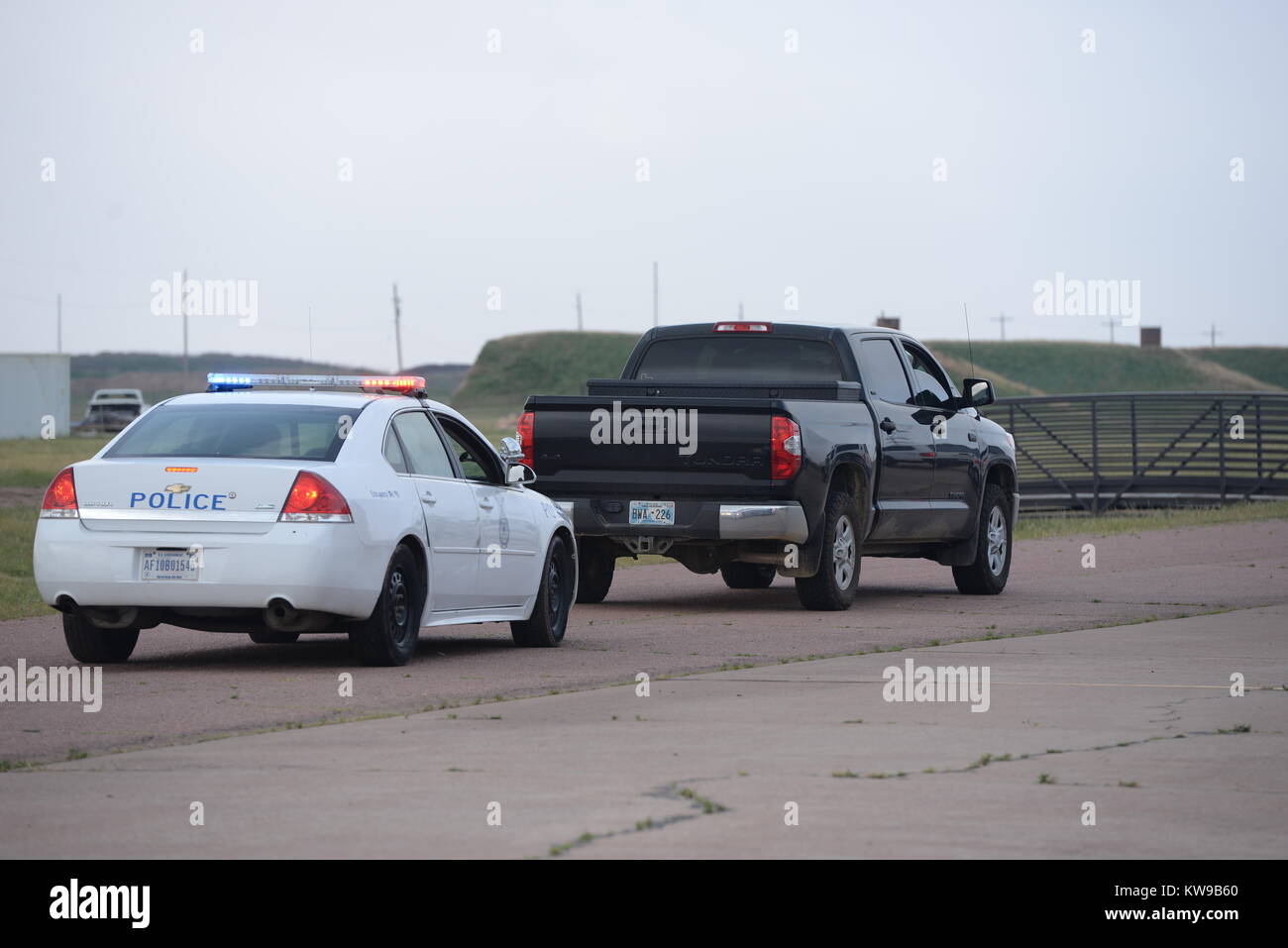 Police Car Pulling Over a Vehicle Stock Photo Alamy