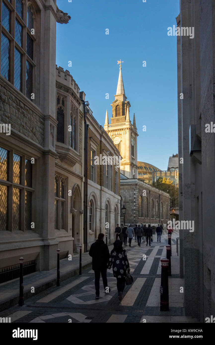 View of 17th-century St Lawrence Jewry spire along Guildhall Buildings, a narrow alley way next to Guildhall Art Gallery leading to Guildhall Yard, Lo Stock Photo