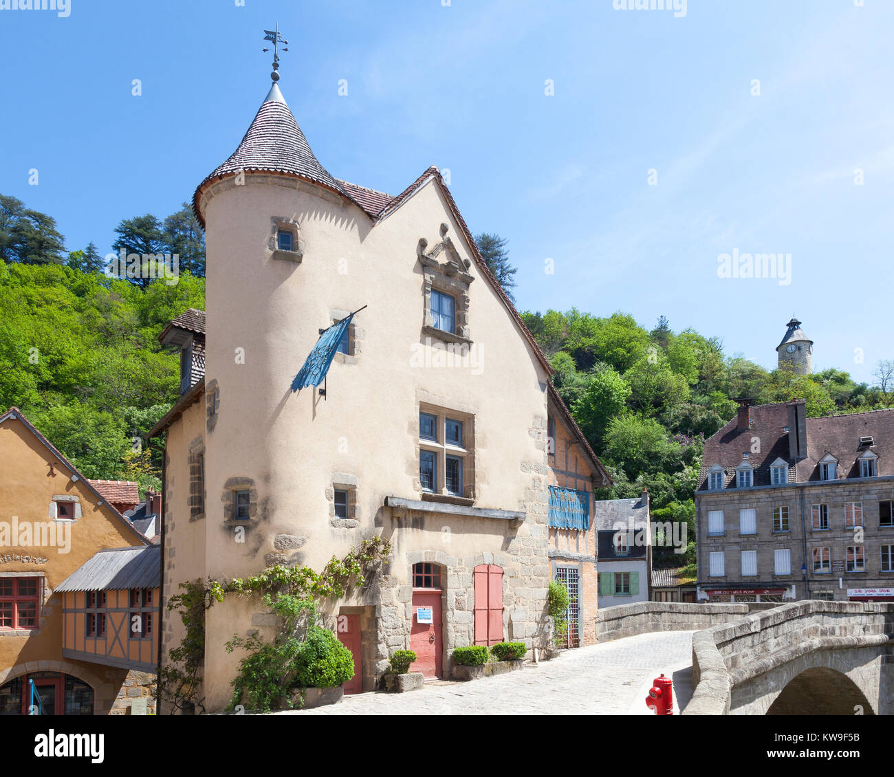 Picturesque medieval tapestry museum and Pont de la Terrade, Aubusson, Creuse, Nouvelle-Aquitaine, France over the River Creuse Stock Photo