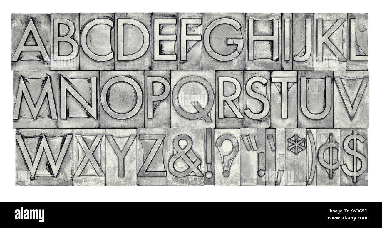 English alphabet, dollar, cent and punctuation signs in vintage metal type, black and white image with platinum toning Stock Photo