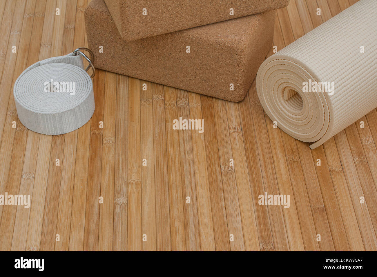 Yoga Class Supplies On Bamboo Mat Floor Ready For Yoga Retreat