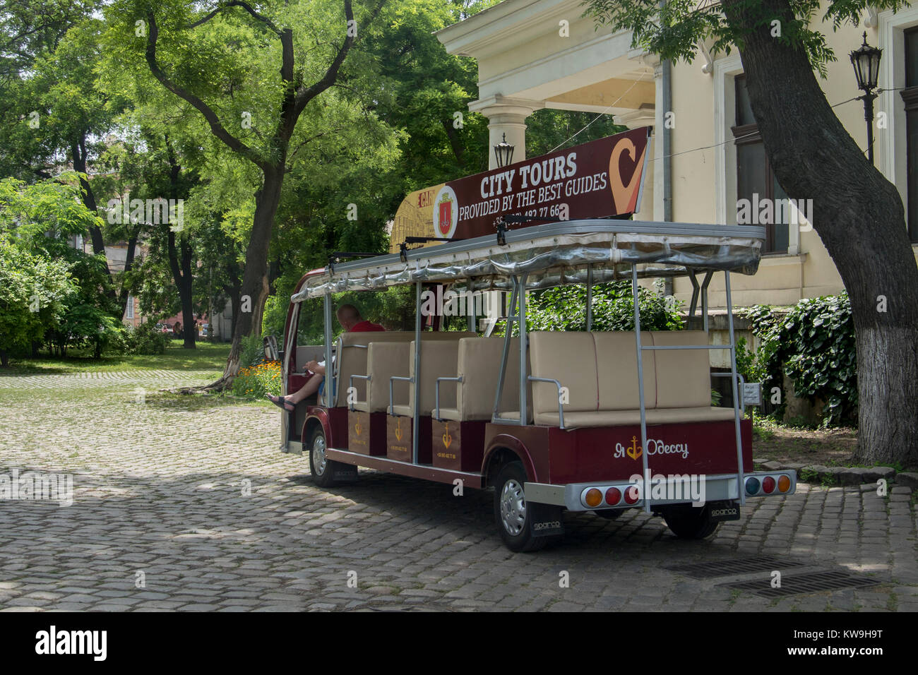 ODESSA, UKRAINE - JUNE 18, 2016:  Small Sightseeing Coach beside Vorontsov Palace Stock Photo