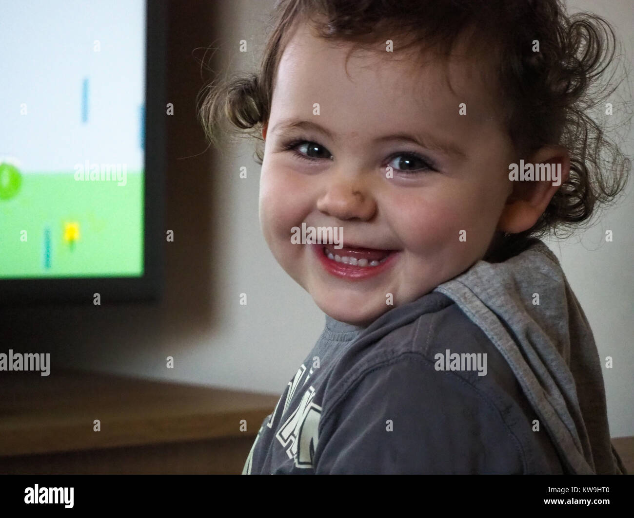 cheeky boy with cheeky smile Stock Photo