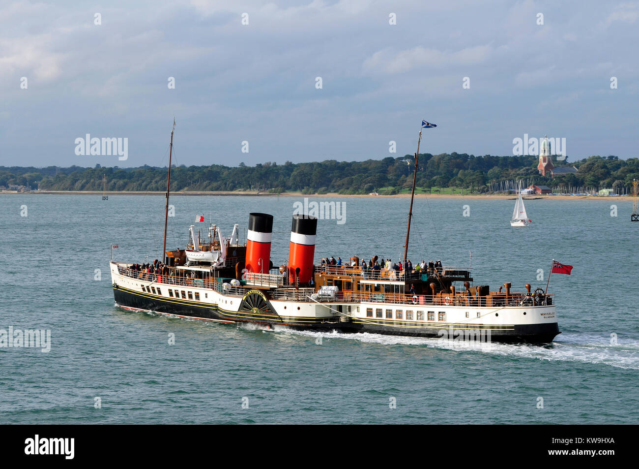 the Waverly paddle steamer taking passengers on a voyage or day trip along Southampton water in Hampshire. The Waverly excursions for ship and steam. Stock Photo