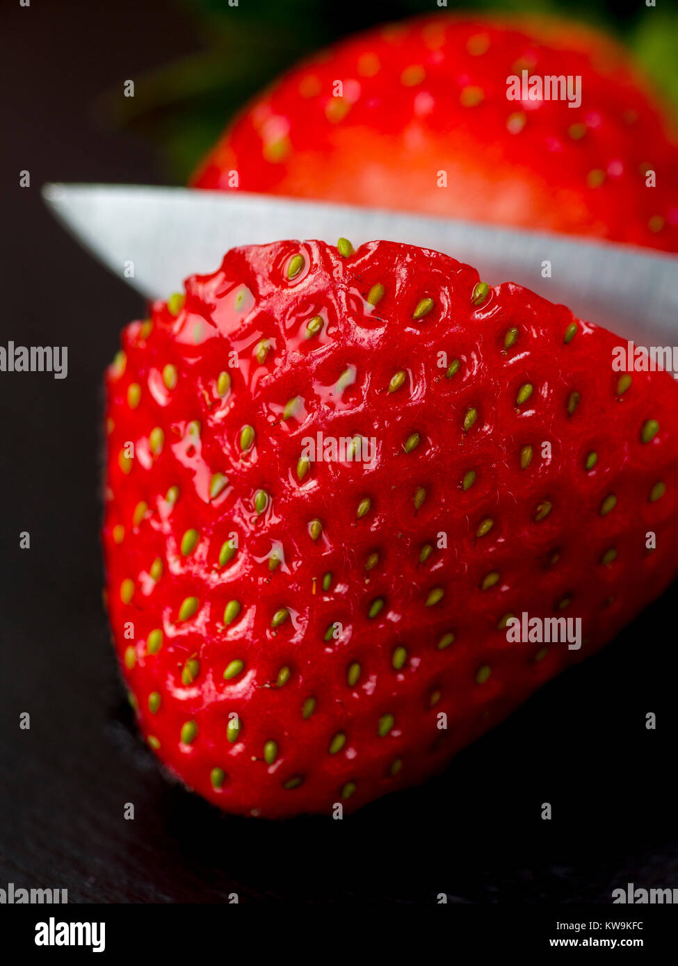 A macro photograph of a fresh sliced strawberry Stock Photo - Alamy