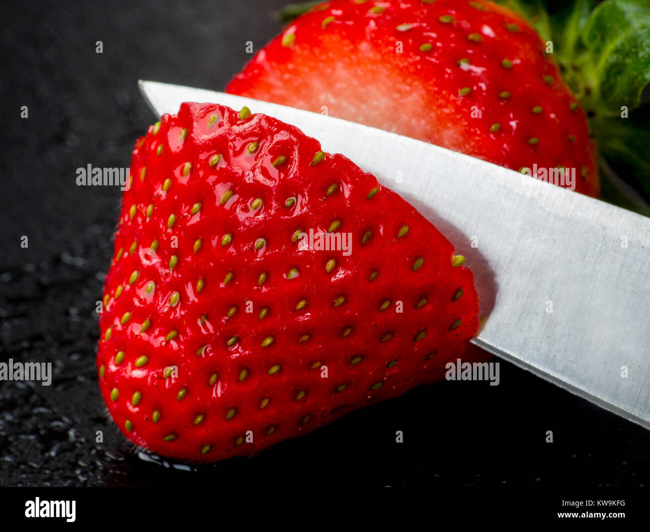 A macro photograph of a fresh sliced strawberry Stock Photo - Alamy