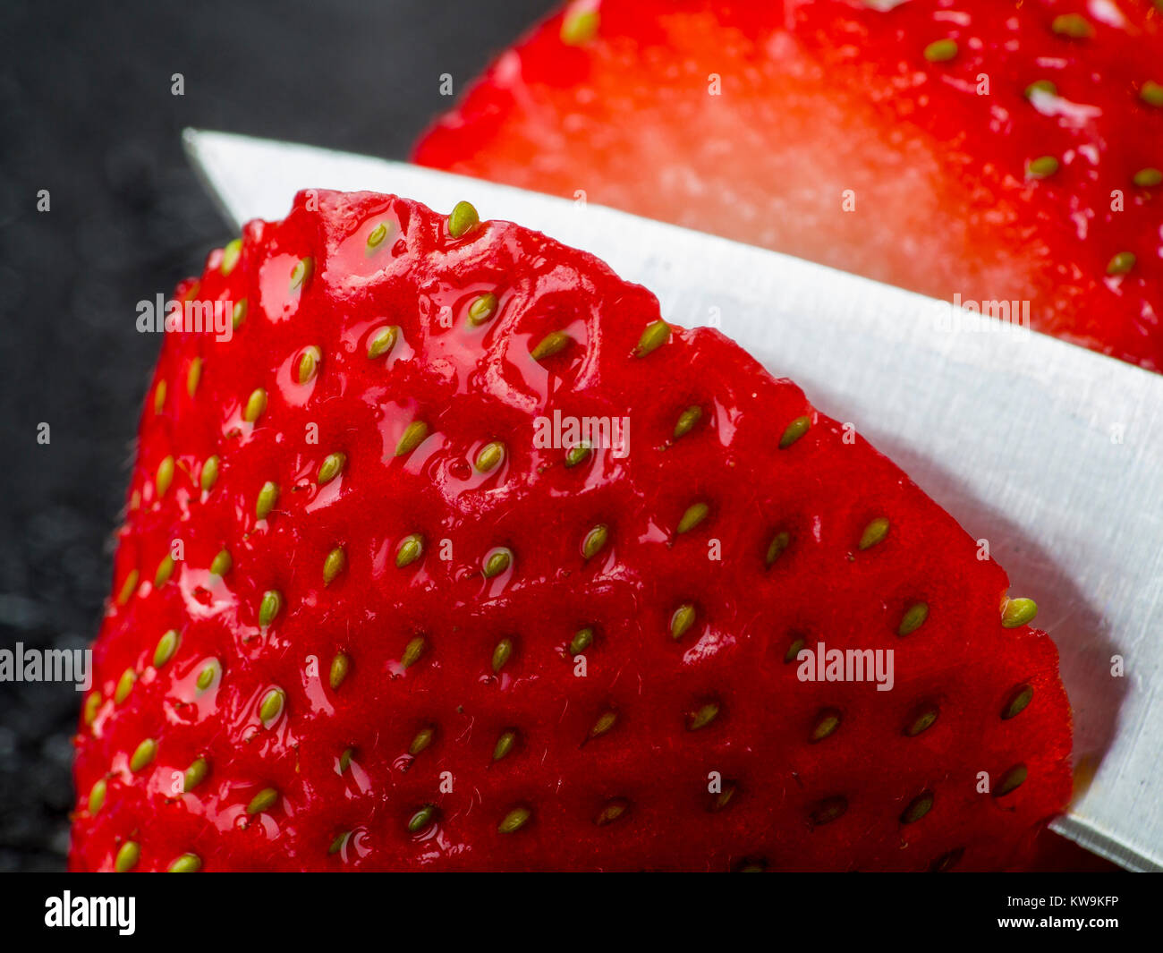 A macro photograph of a fresh sliced strawberry Stock Photo - Alamy