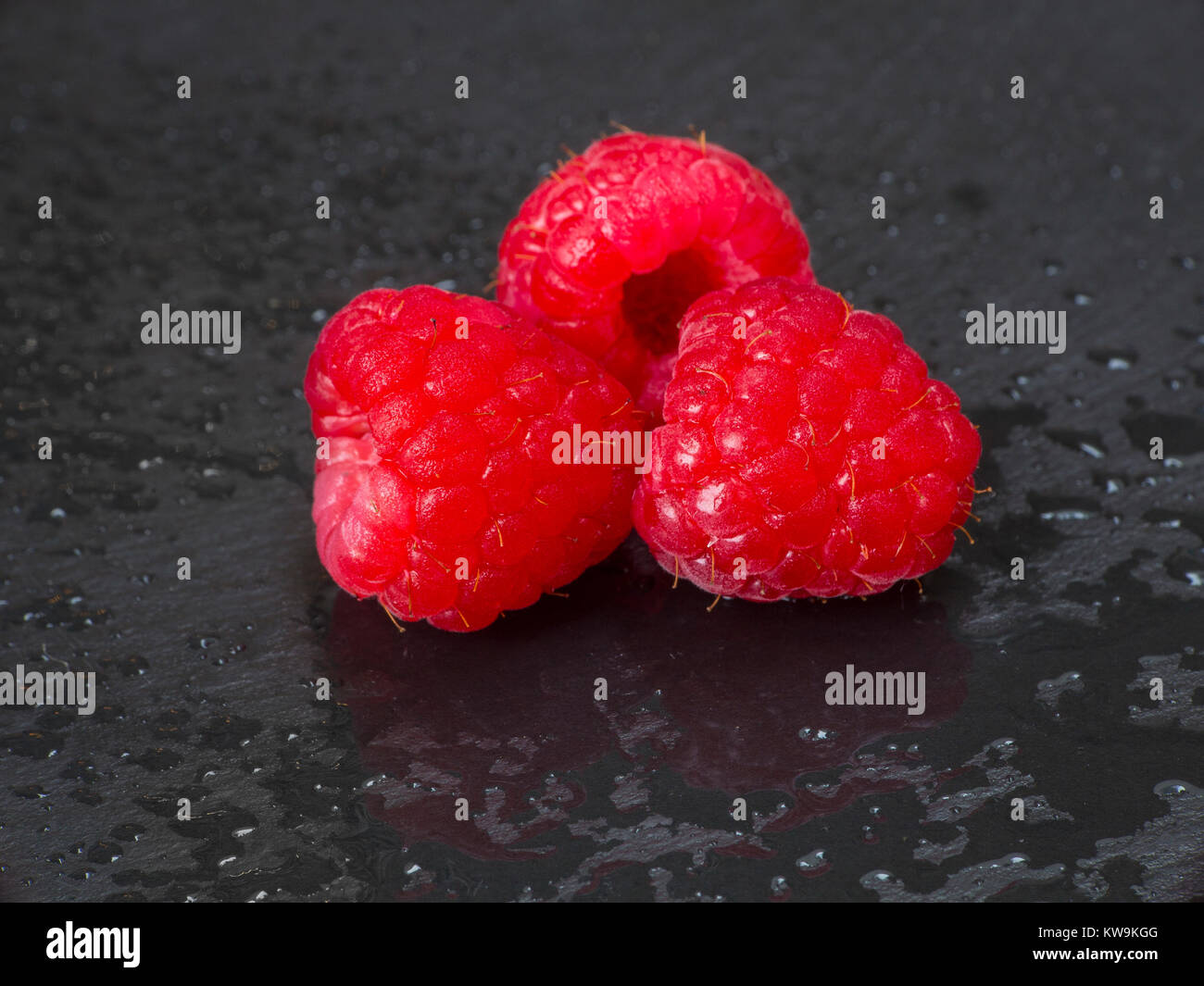 Some Raspberries A macro photograph of some fresh raspberries Stock Photo - Alamy