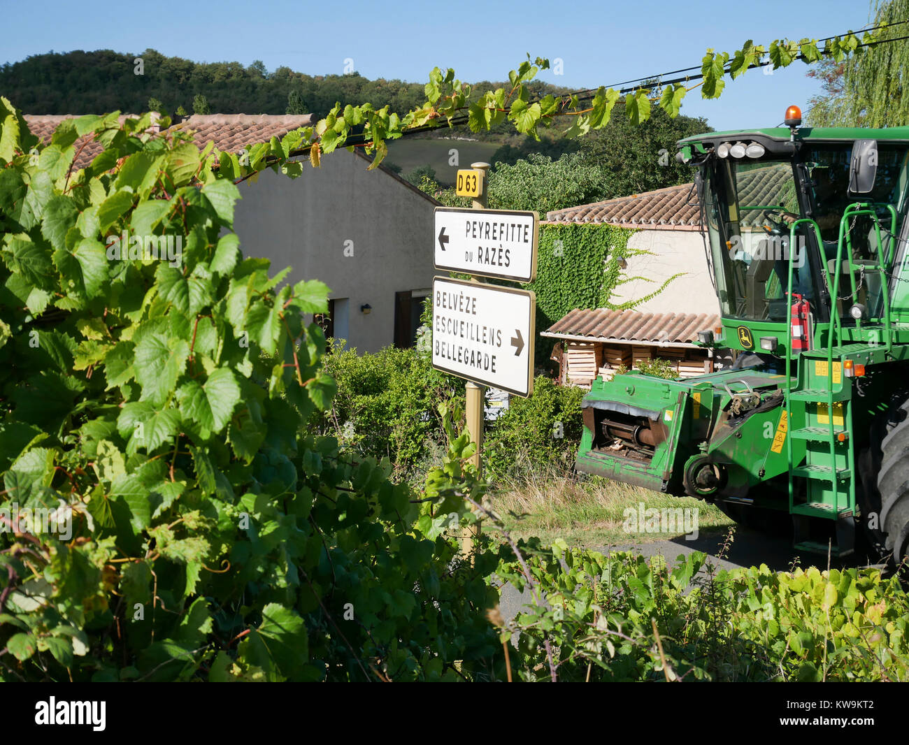 grape picking tractor on way to vineyards in villages around Belveze-du-Razes Stock Photo