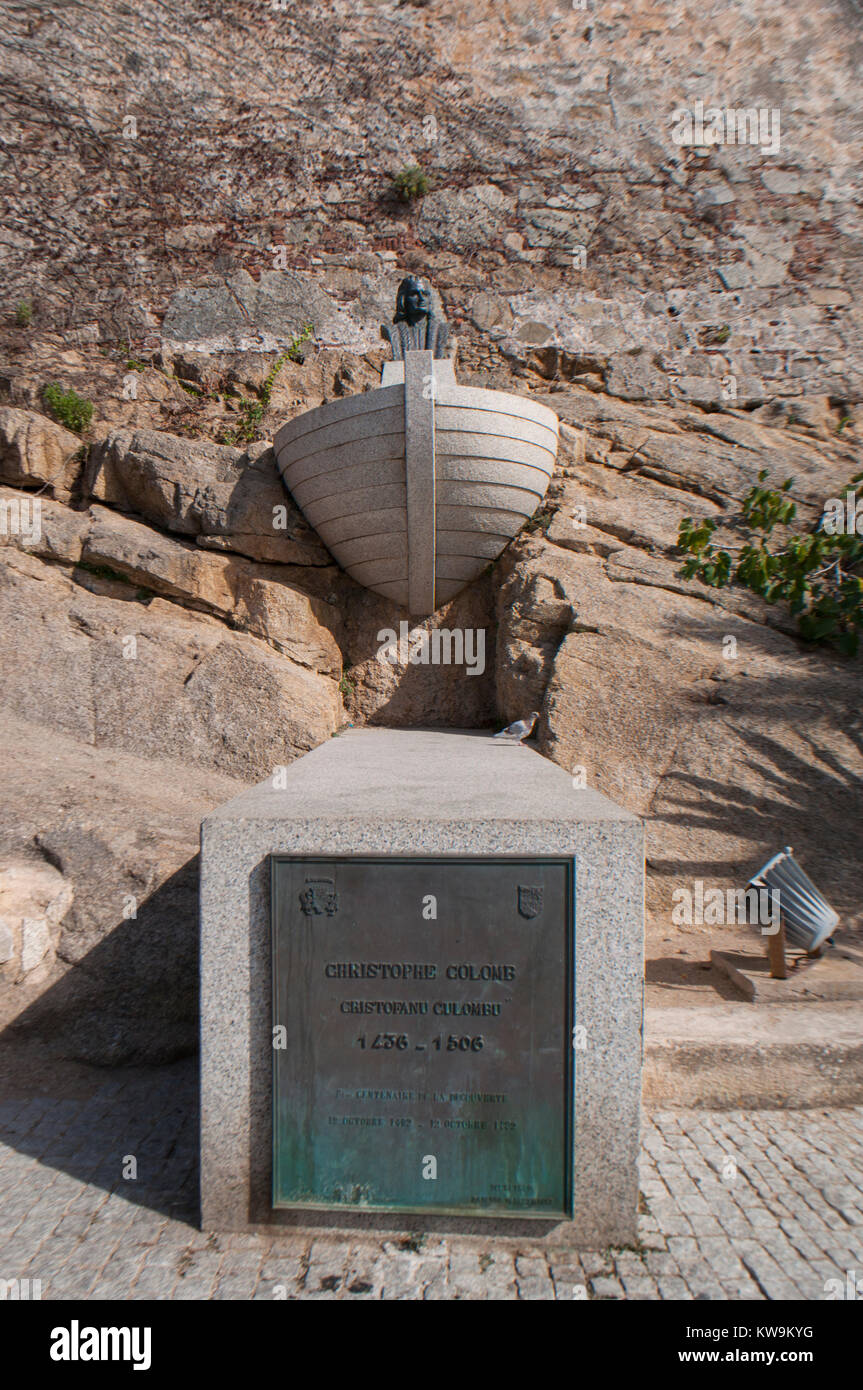 Corsica: view of the commemorative monument of Christopher Columbus on the ancient walls of the perched Citadel of Calvi, famous tourist destination Stock Photo