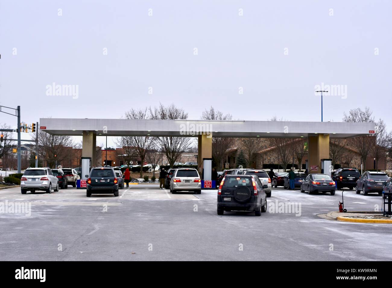 Cars lined up t get gasoline at Costco Wholesale gasoline Stock Photo