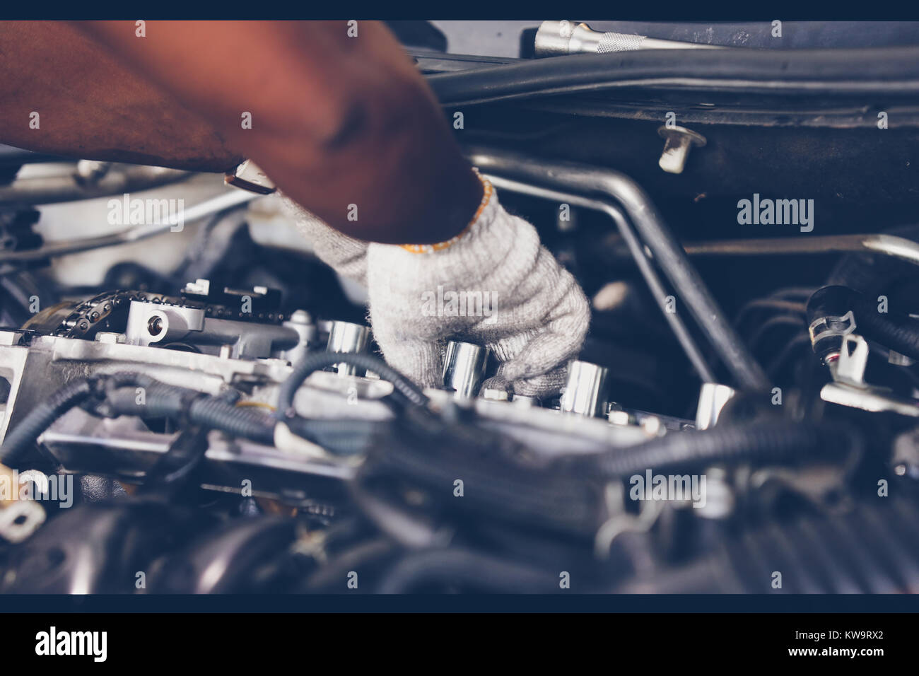 Hands of auto mechanic repairing car. Selective focus Stock Photo Alamy