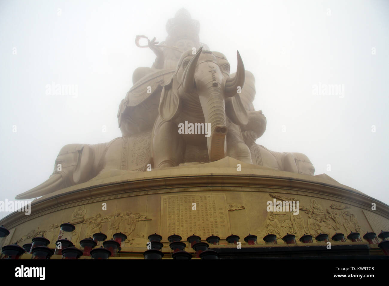 Big golden elephant in the cloud on the top of EmeiShan mountain, China Stock Photo