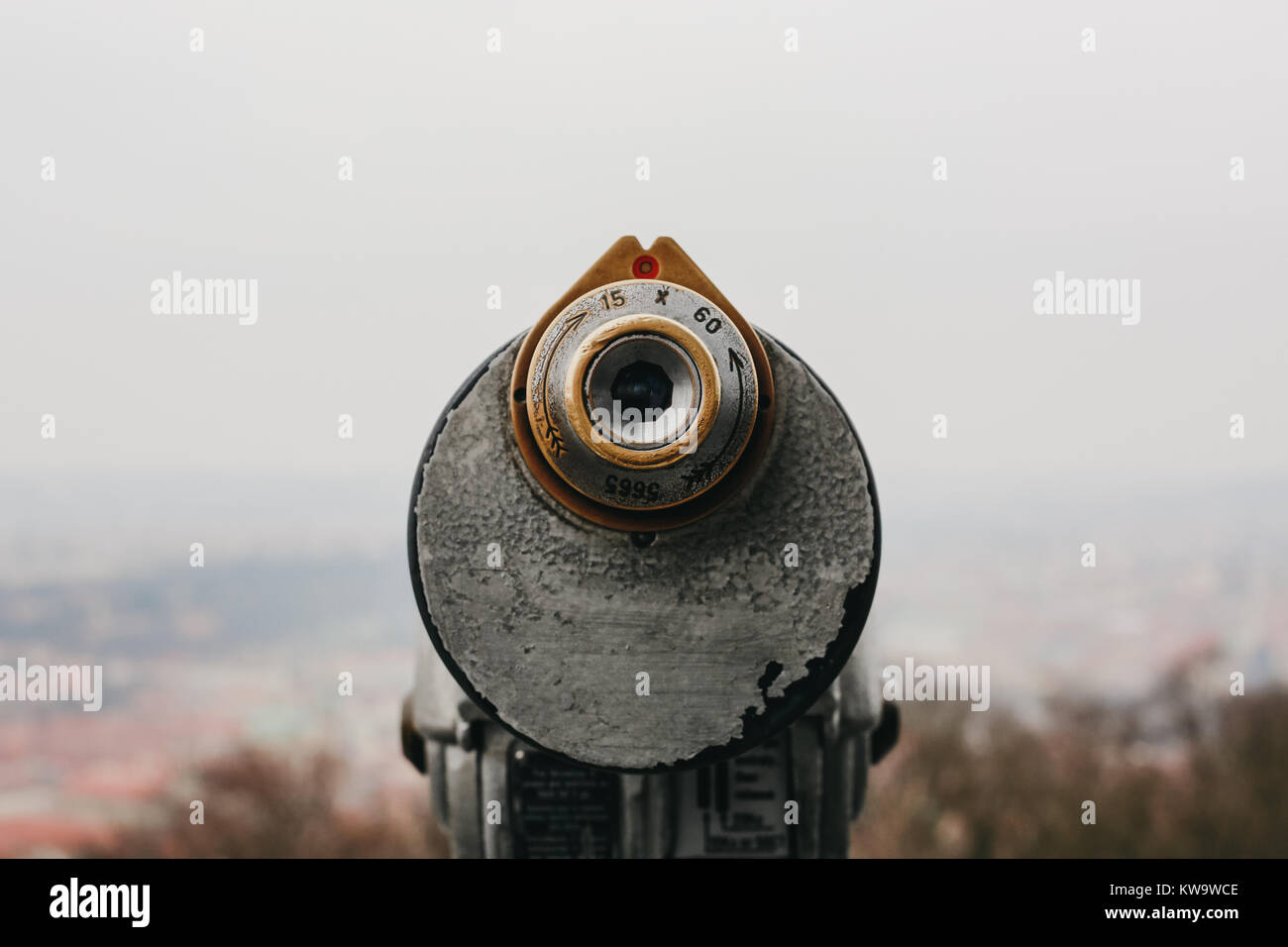 Coin operated binoculars on the viewing platform, Prague, Czech Republic with the blurred city background. Stock Photo