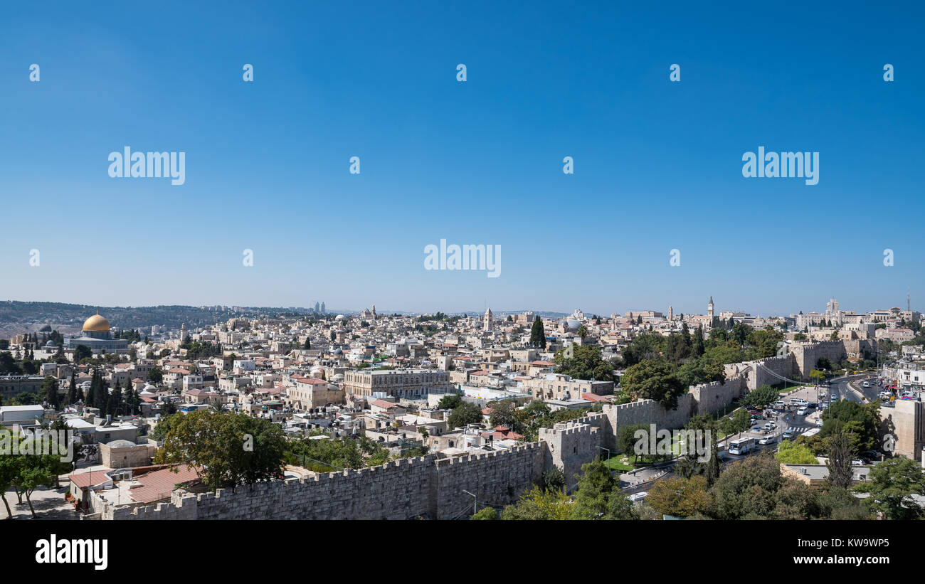 Skyline of the Old City of Jerusalem, including the city walls, Dome of the Rock, the Holy Sepulchre and other holy places. Stock Photo