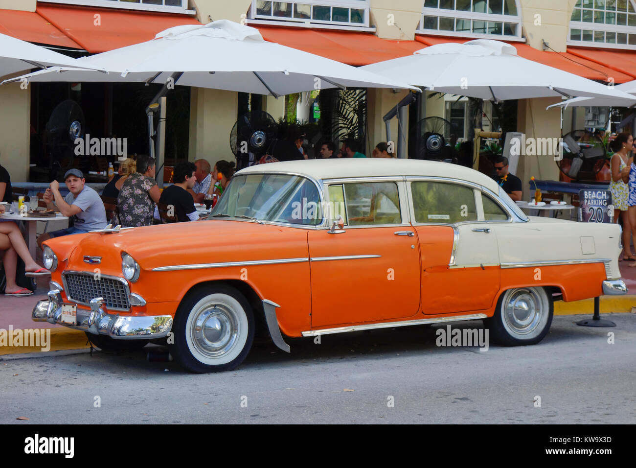 Classic car in front of art deco hotel Edison on Ocean Drive in South Beach district of Miami Beach, Florida, USA Stock Photo