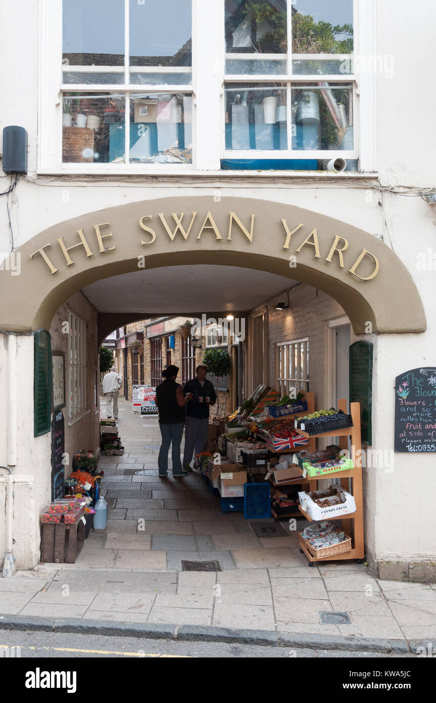 Entrance archway to the Swan Yard, Sherbourne, Dorset, England, UK. Stock Photo