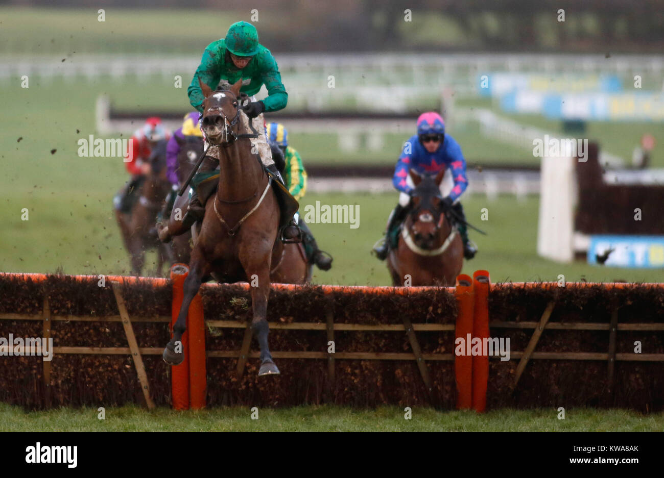 Wholestone and Daryl Jacob clear the last flight before going on to win The Dornan Engineering Relkeel Hurdle Race run during the New Year's Day Meeting at Cheltenham Racecourse. Stock Photo