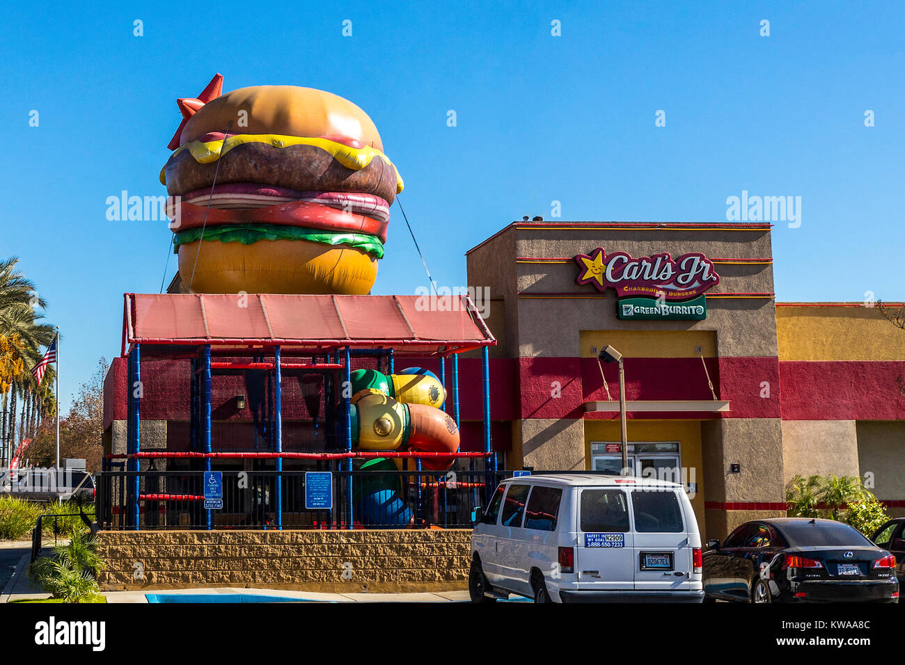 A Carls Jr. restaurant in Upland California with a blow up burger on