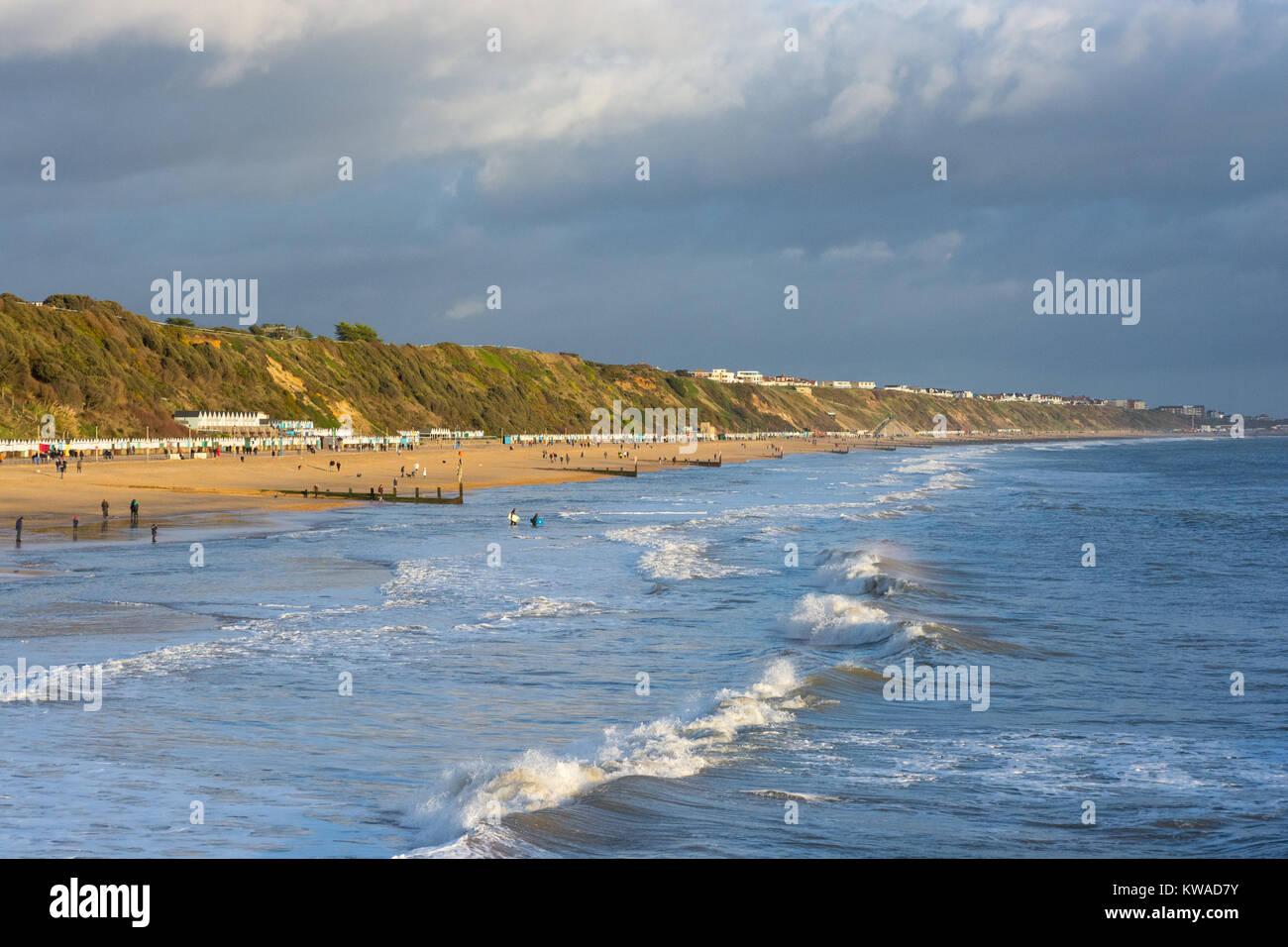 Bracing bank holiday weather: fresh air on New Year's Day with strong winds and bright sunshine on Boscombe Beach, Bournemouth, Dorset, UK . Stock Photo