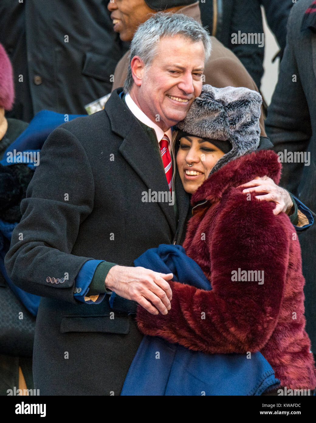 New York, USA. 1st Jan, 2018. New York City´s Mayor Bill de Blasio is congratulated by his daughter Chiara after taking the oath of office. De Blasio started his second term as Mayor of USA's largest city with an outdoors inauguration ceremony at City Hall under freezing temperatures on January 1st, 2018. Credit: Enrique Shore/Alamy Live News Stock Photo