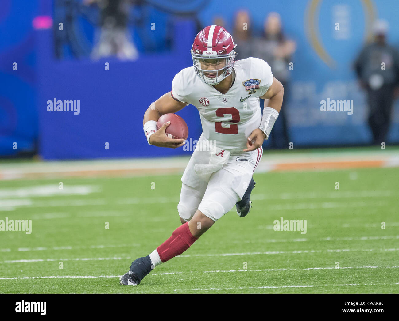 New Orleans, LA, USA. 1st Jan, 2018. Alabama QB Jalen Hurts #2 runs with the ball during the Allstate Sugar Bowl football game between the Clemson Tigers and the Alabama Crimson Tide at the Mercedes-Benz Supedome in New Orleans, LA. Kyle Okita/CSM/Alamy Live News Stock Photo