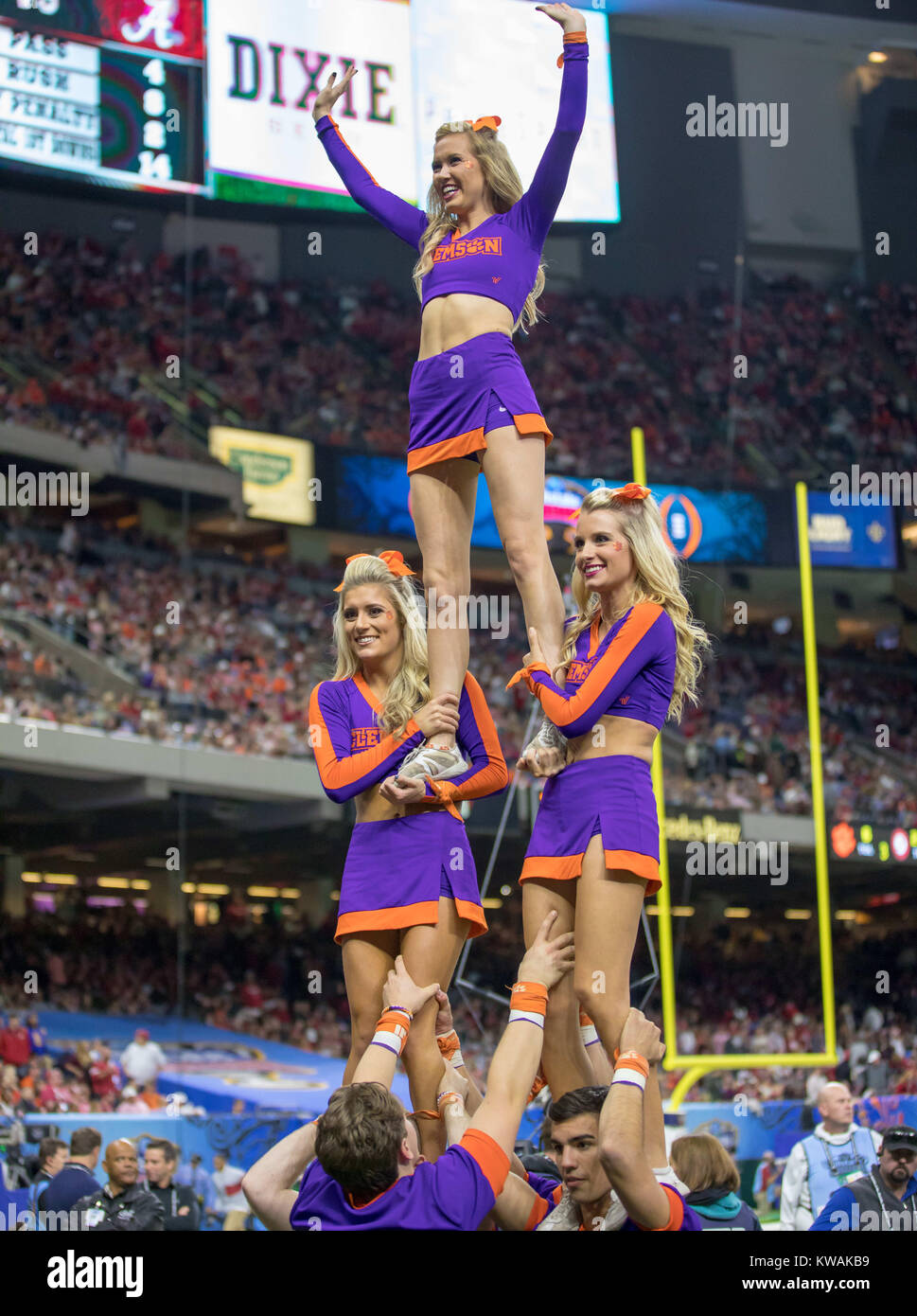 New Orleans, LA, USA. 1st Jan, 2018. The Clemson cheerleaders perform a pyramid stunt on the sidelines during the Allstate Sugar Bowl football game between the Clemson Tigers and the Alabama Crimson Tide at the Mercedes-Benz Supedome in New Orleans, LA. Kyle Okita/CSM/Alamy Live News Stock Photo