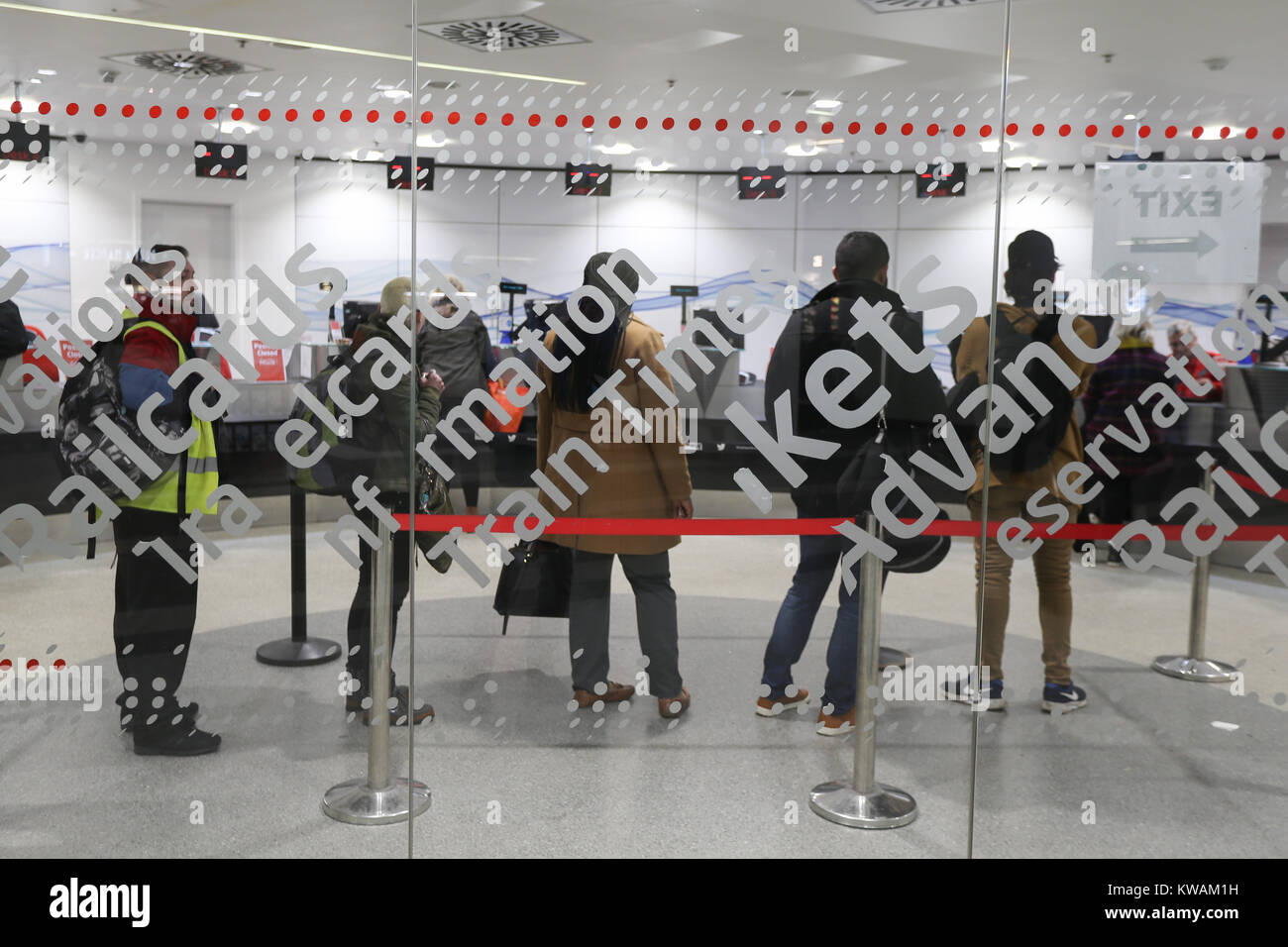 Birmingham New Street, UK. 2nd Jan, 2018. Commuters in New Street Sation queue for their tickets for the daily journey to work after a rise in rail fares comes into effect today. Credit: Peter Lopeman/Alamy Live News Stock Photo