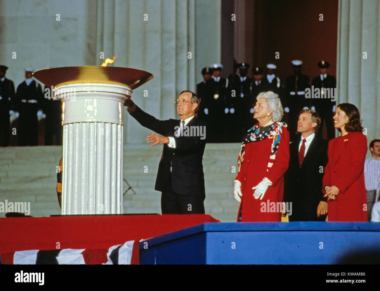United States President-elect George H.W. Bush participates in the ceremonial candle lighting to conclude the opening ceremony for his inauguration at the Lincoln Memorial in Washington, DC on January 18 1989. From left to right: President-elect Bush, Barbara Bush, Marilyn Quayle, and US Vice President-elect Dan Quayle. Credit: Robert Trippett/Pool via CNP - NO WIRE SERVICE - Photo: Robert Trippett/Consolidated/dpa Stock Photo