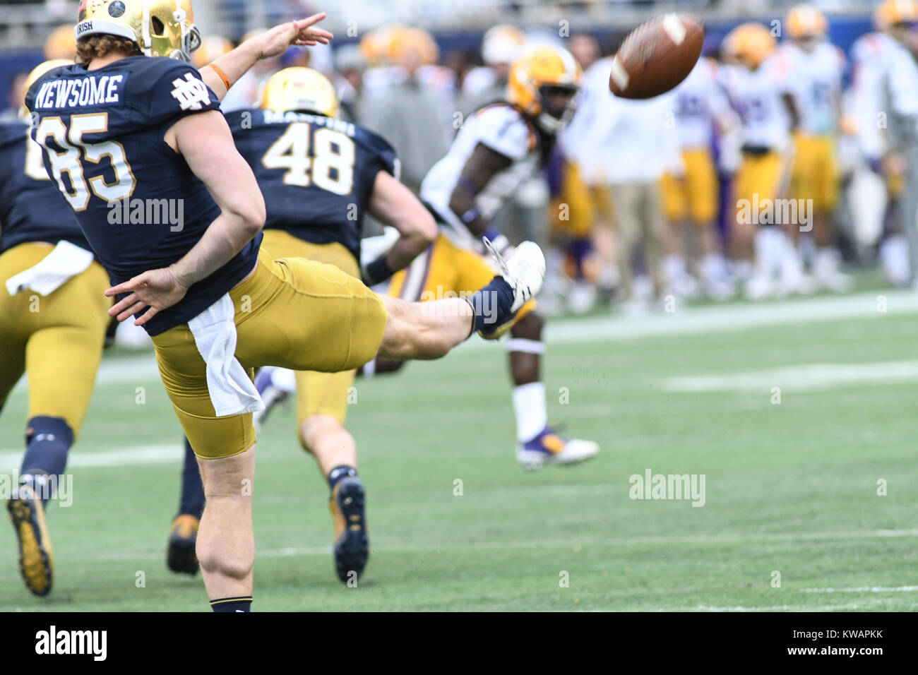 Orlando, Florida. 1st January, 2018. Notre Dame's Newsome is force to make a kick. Credit: Marty Jean-Louis/Alamy Live News Stock Photo