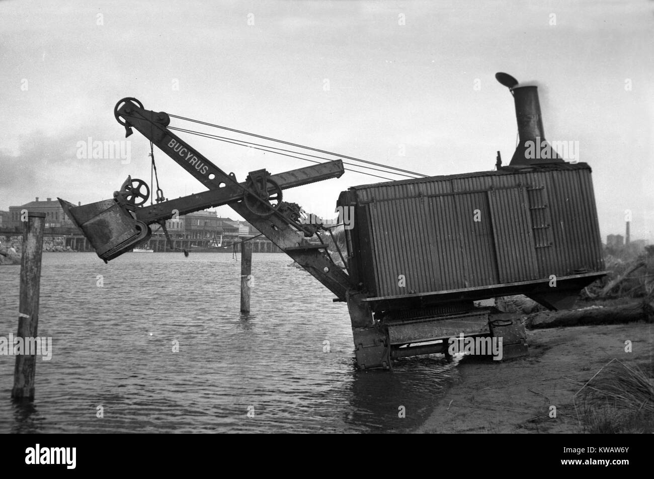 Steam-powered digger working near the Grey River, Greymouth, Westland, New Zealand, probably 1930s Stock Photo