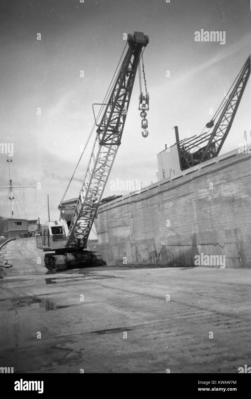 Crane working on the south tiphead, Greymouth, Westland, New Zealand