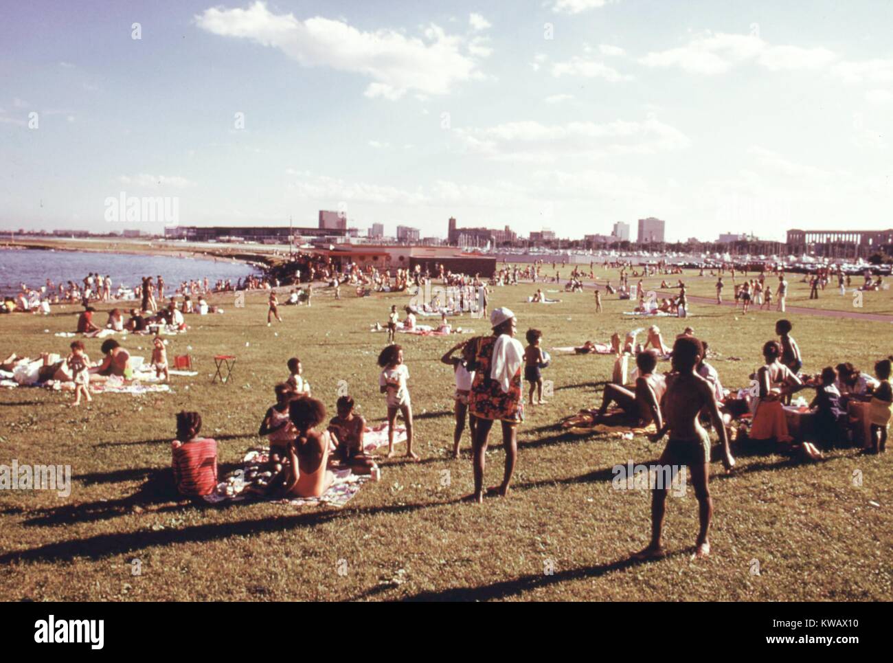 Chicago families socialize in the sun at the 12th Street beach on Lake  Michigan, Illinois, August, 1973. Image courtesy John White/US National  Archives Stock Photo - Alamy