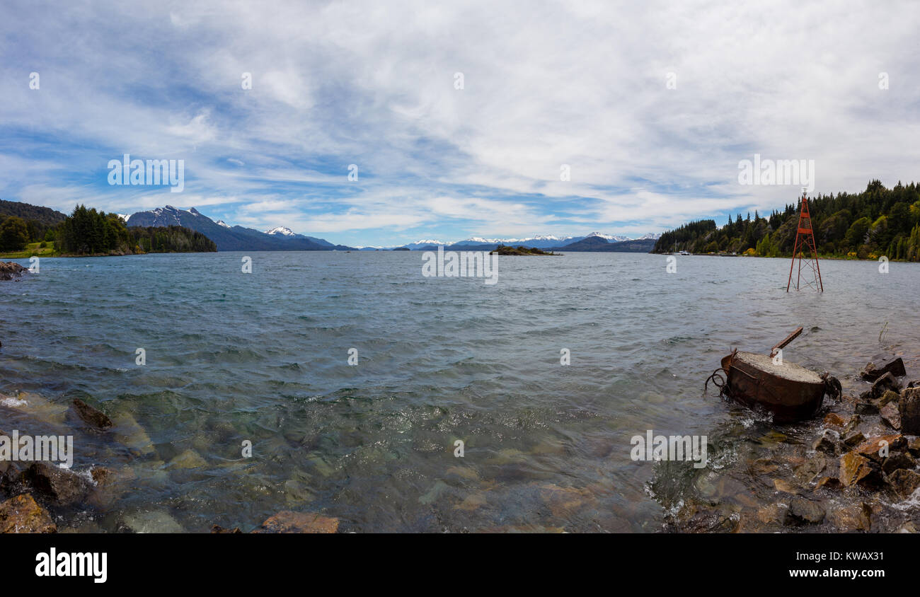 A panorama taken from Puerto Pañuelo outside Bariloche. A hill chain in the background and unbelievable clear water in the front. Stock Photo
