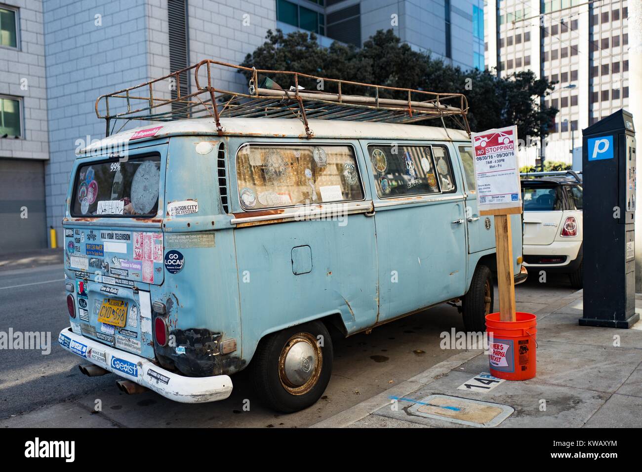 Beat up blue Volkswagen bus, covered in bumper stickers, parked along the  street in the Tenderloin neighborhood of San Francisco, California, October  2, 2016 Stock Photo - Alamy