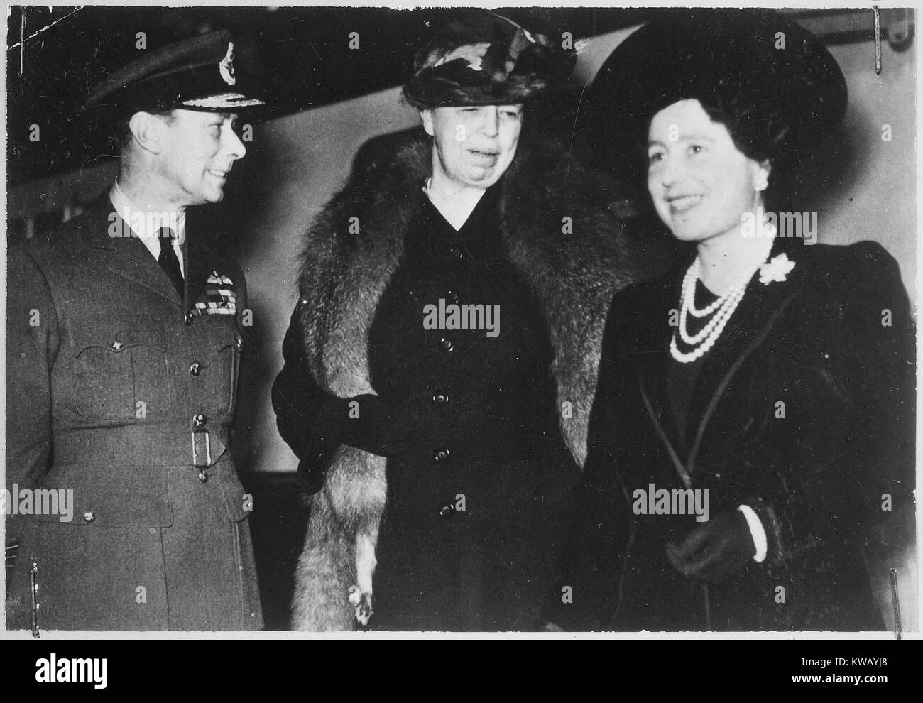 (Left to right): King George VI, Eleanor Roosevelt, and Queen Elizabeth in London, England, October 23, 1942. Stock Photo