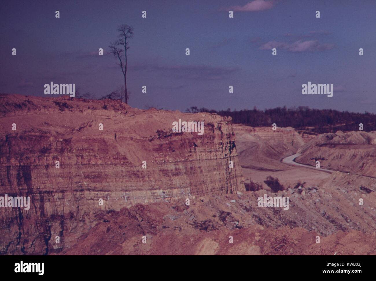 Rocky mountain and a canyon in the barren landscape devastated by the coal strip mining, Barnesville, Ohio, USA, October, 1973. Image courtesy National Archives. () Stock Photo