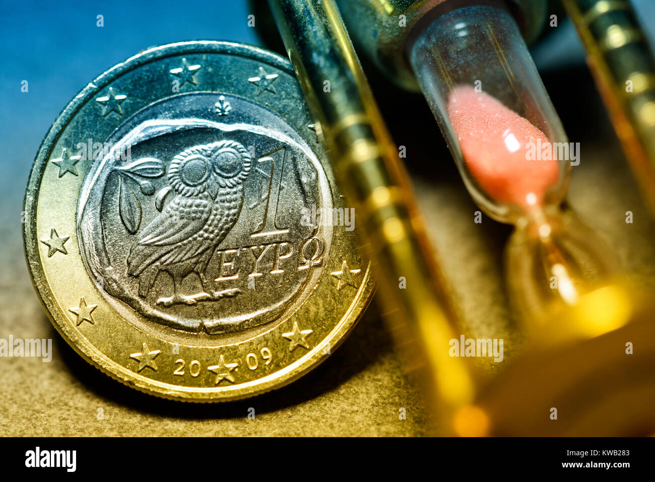 Greek euro-coin one and hourglass, possible euro-escape of Greece, Griechische Ein-Euro-M?nze und Sanduhr, m?glicher Euro-Austritt Griechenlands, Grie Stock Photo